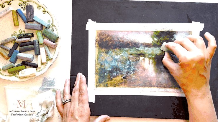 Valerie painting a glowing soft pastel landscape